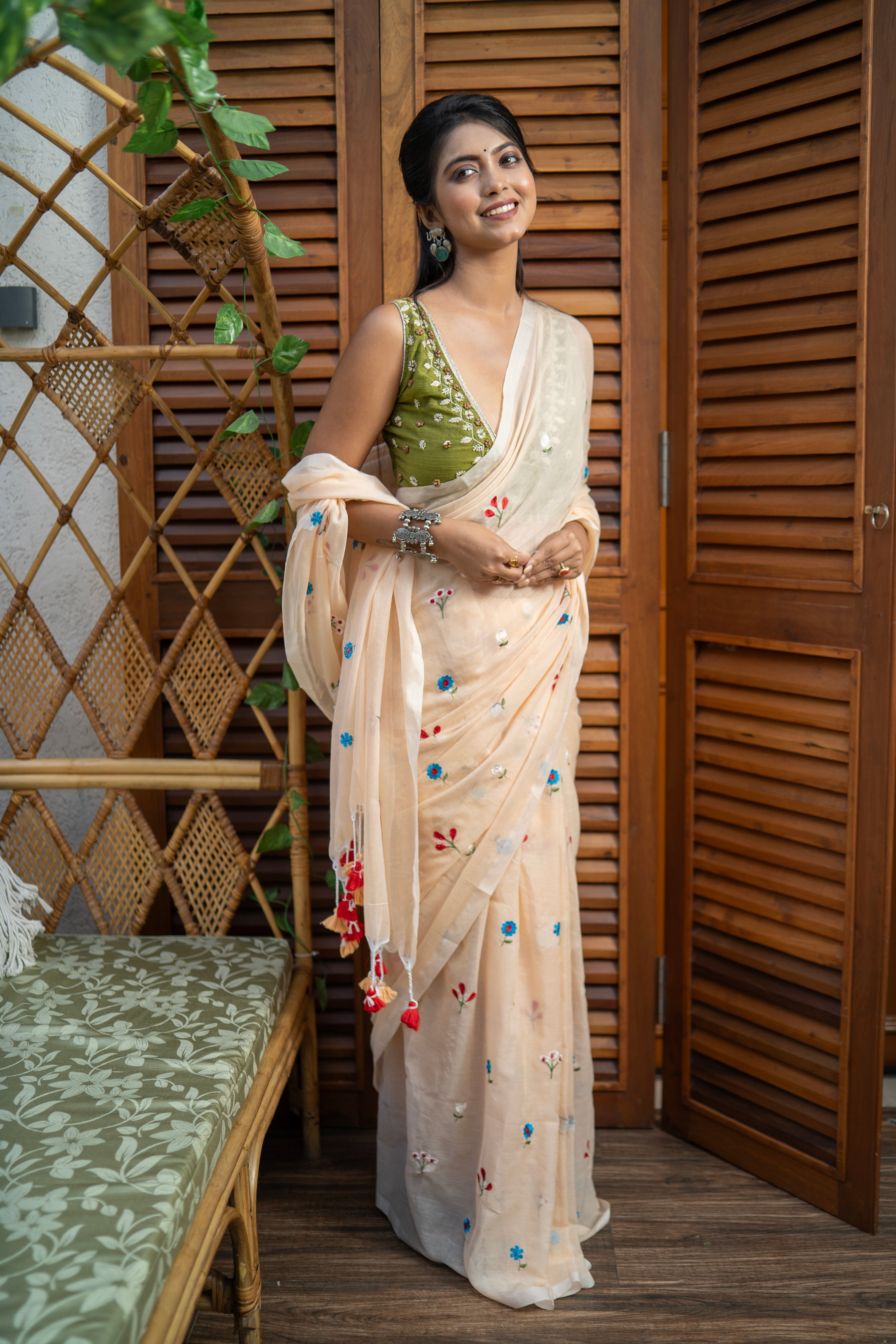 Cream embroidered mulmul cotton saree