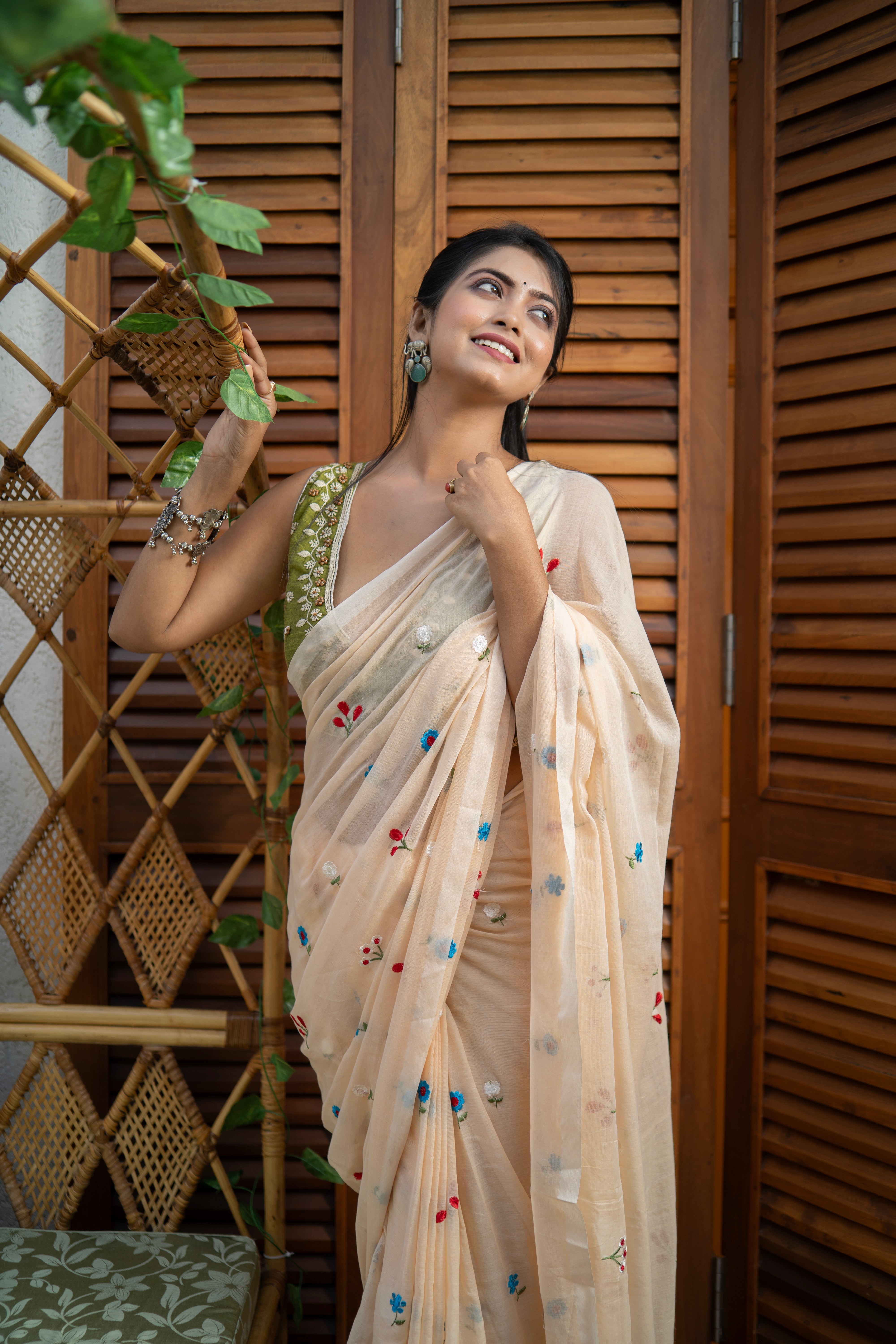 Cream embroidered mulmul cotton saree