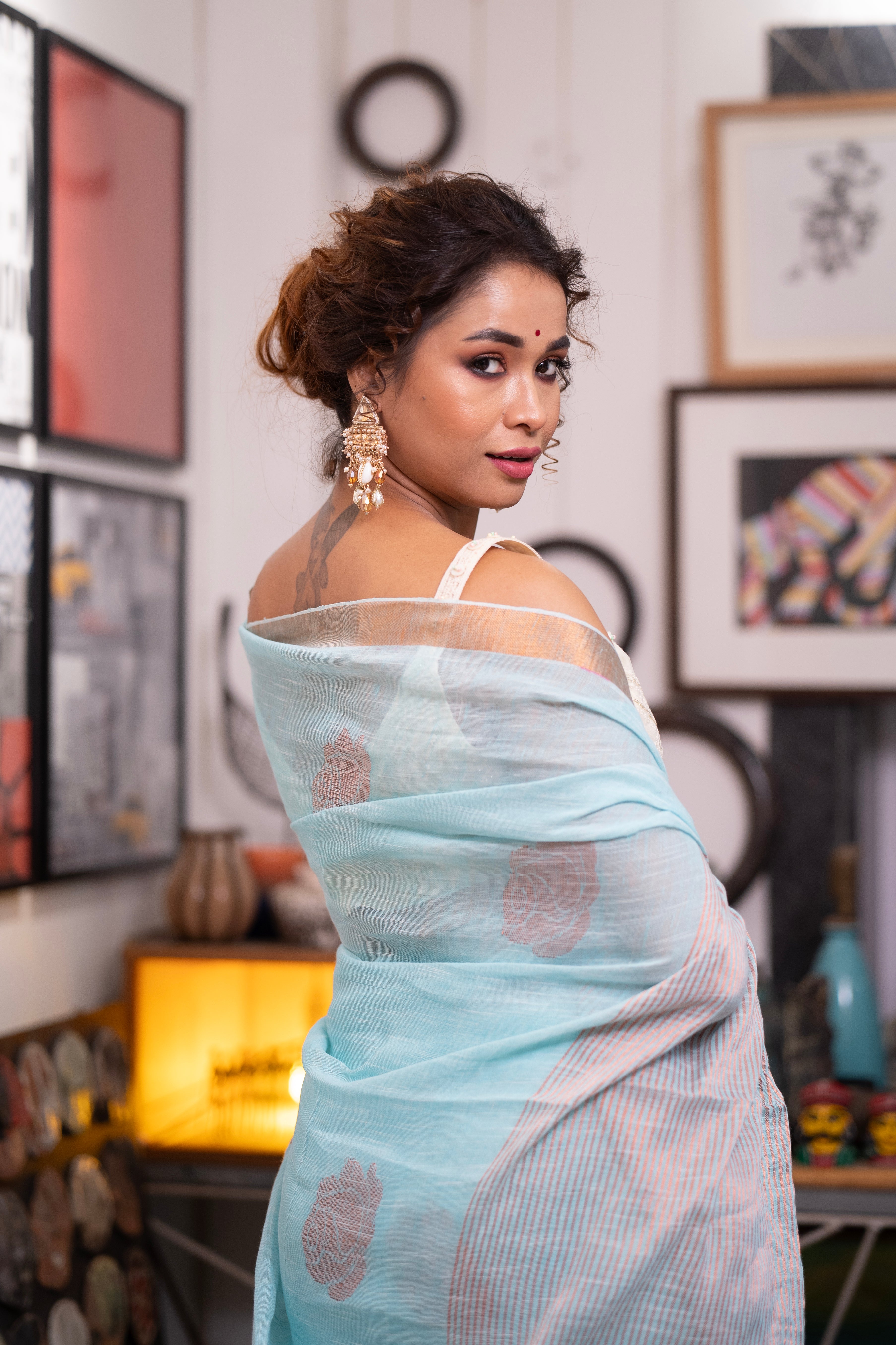 Sky blue Rose motive pure linen hand woven saree