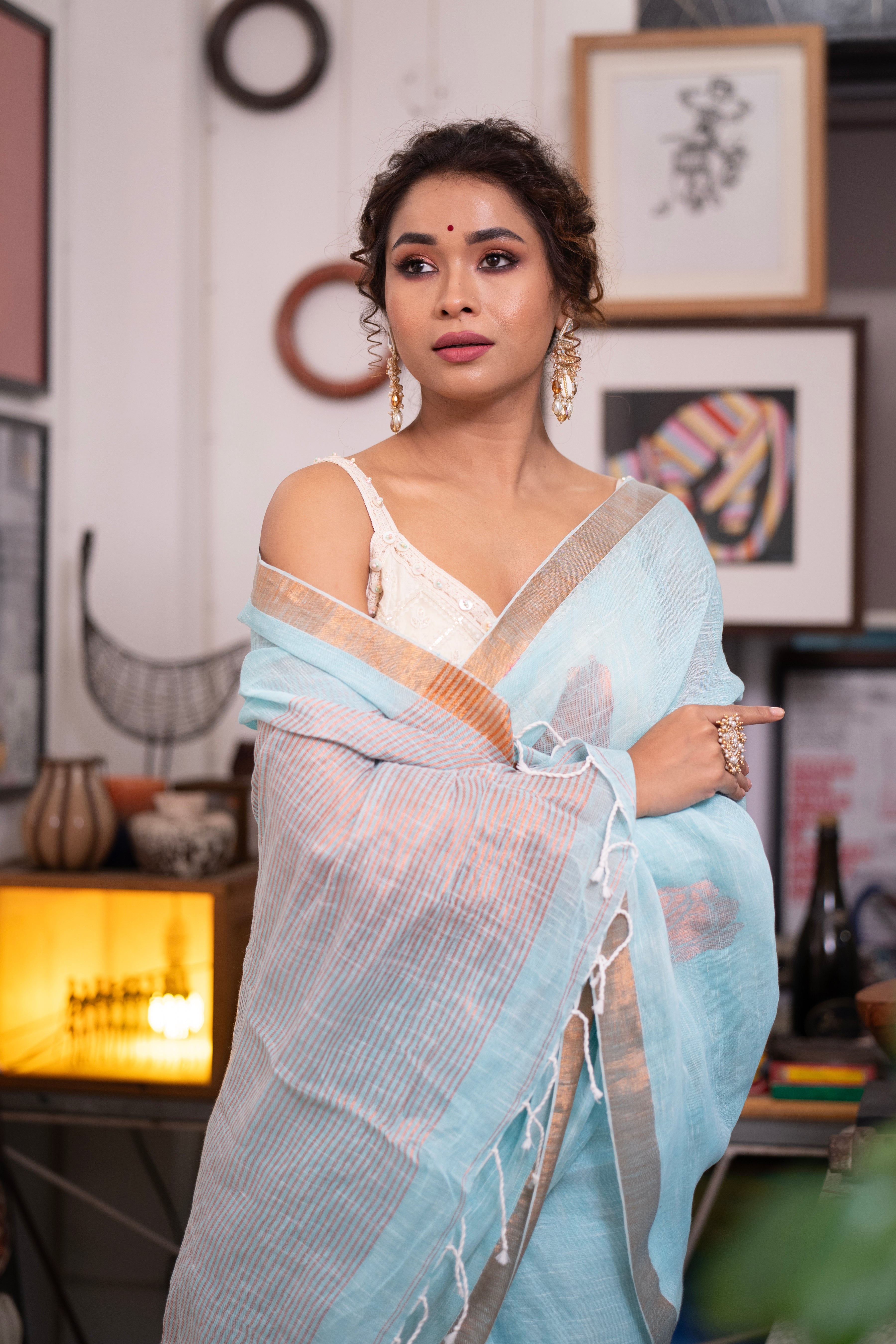Sky blue Rose motive pure linen hand woven saree