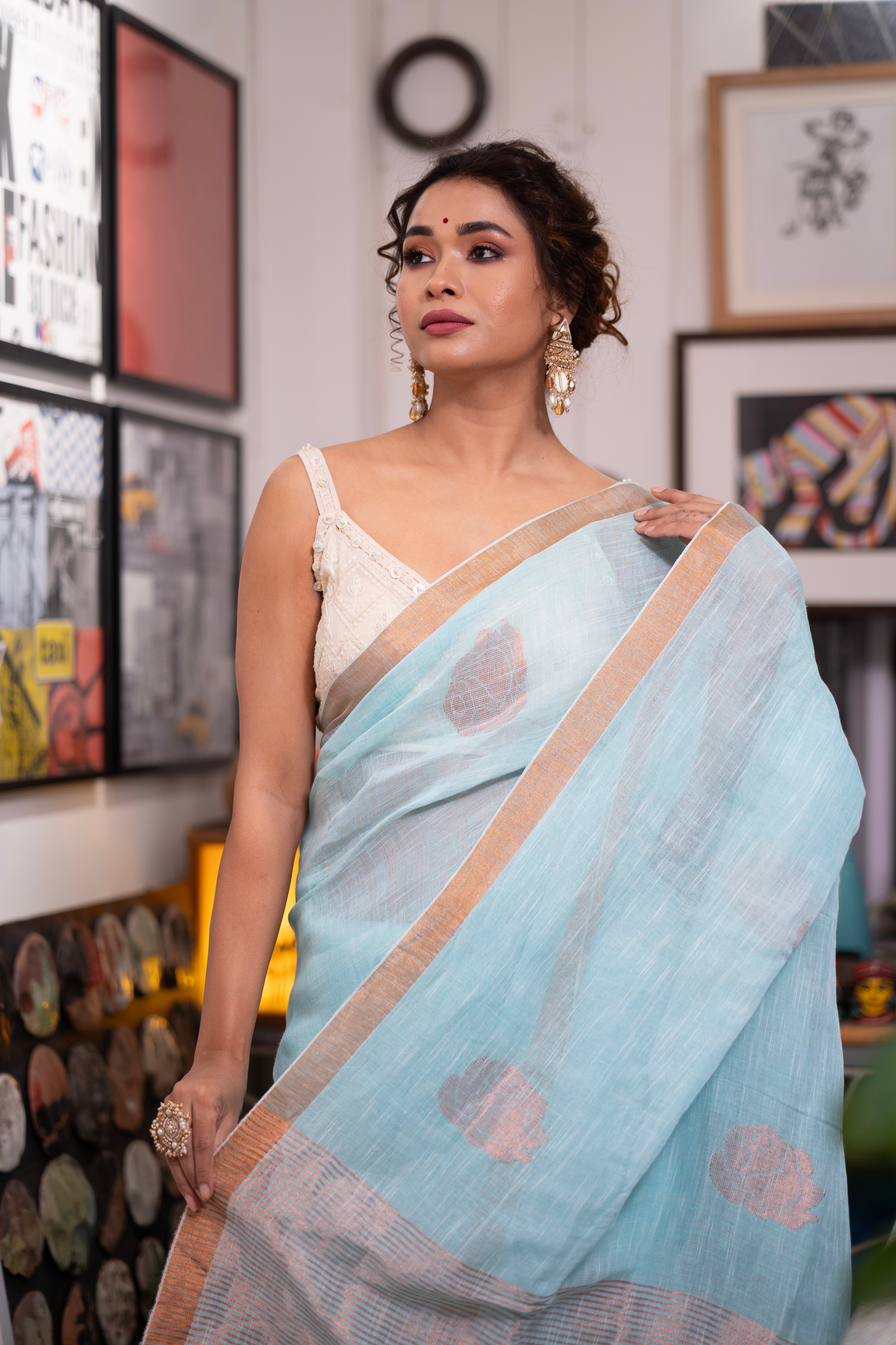 Sky blue Rose motive pure linen hand woven saree