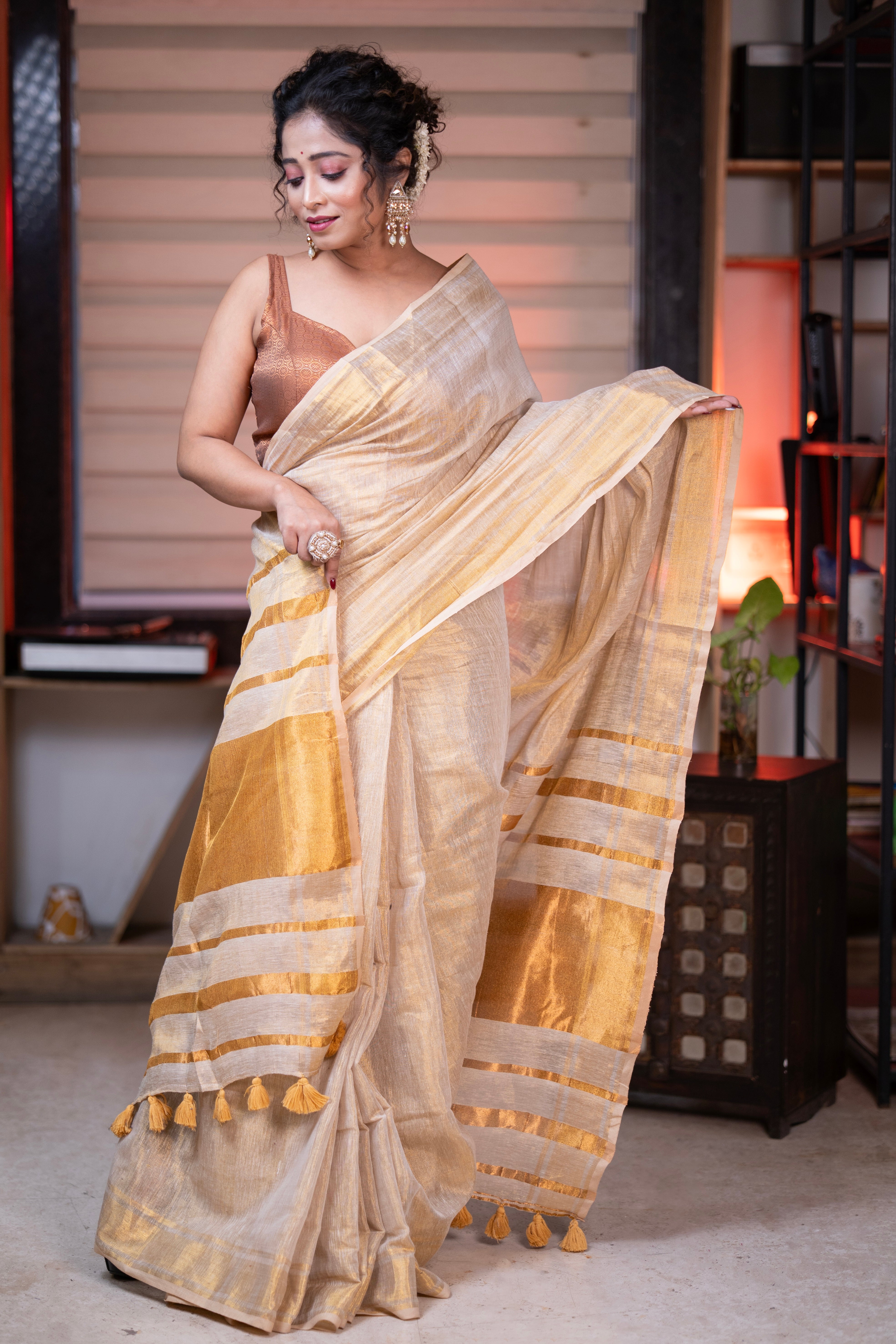 Golden dual tone pure tissue linen saree